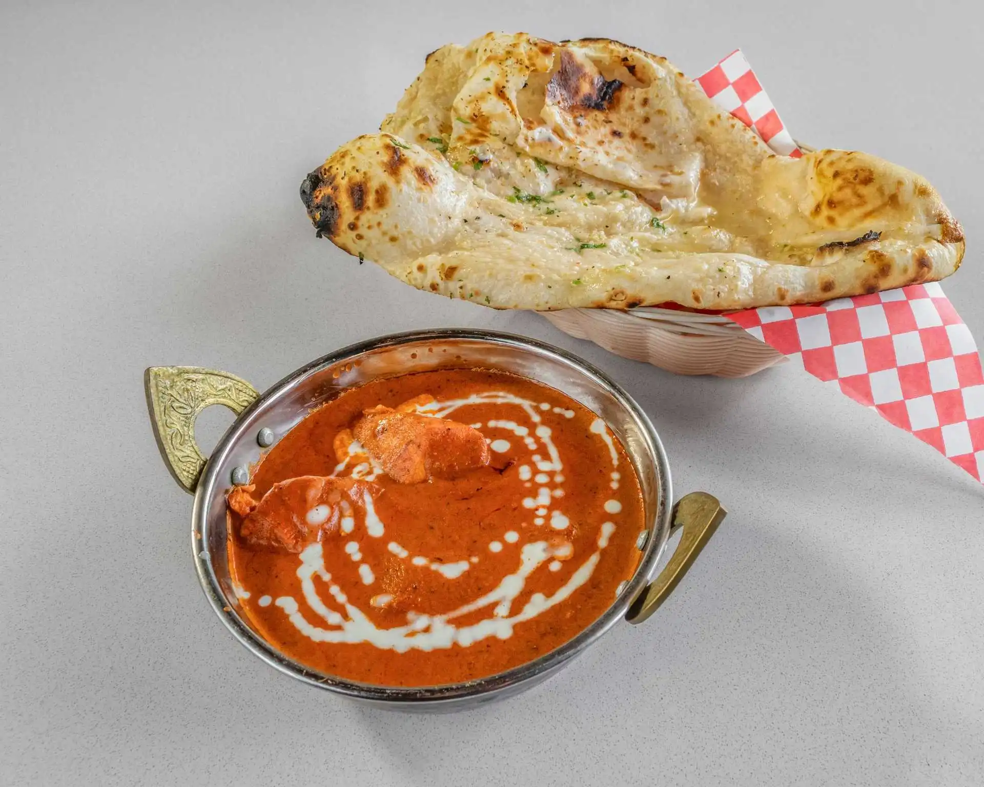 Creamy butter chicken curry with fresh naan at Virk Dhaba London Ontario