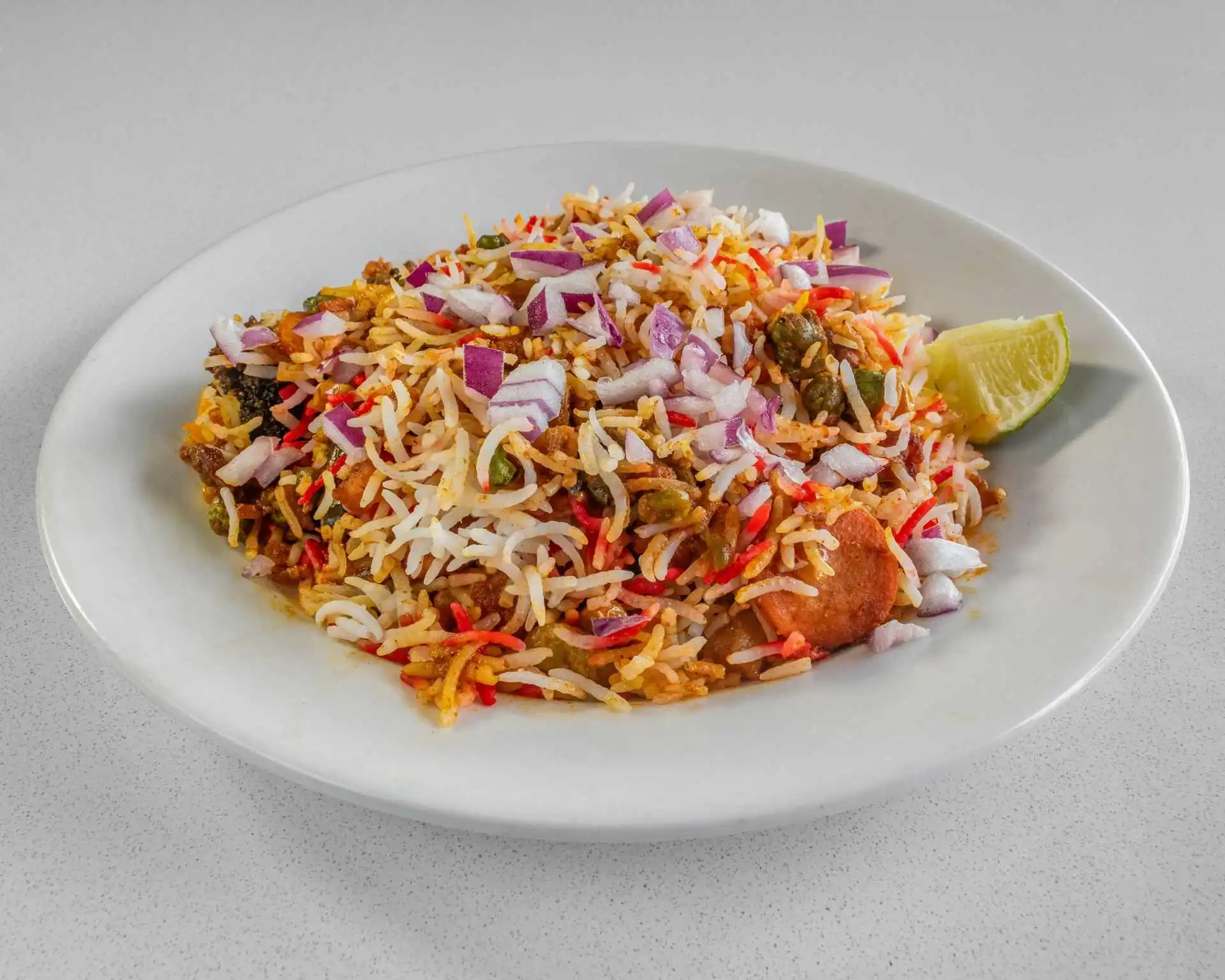 Fragrant basmati biryani with onions and lime at Virk Dhaba London Ontario