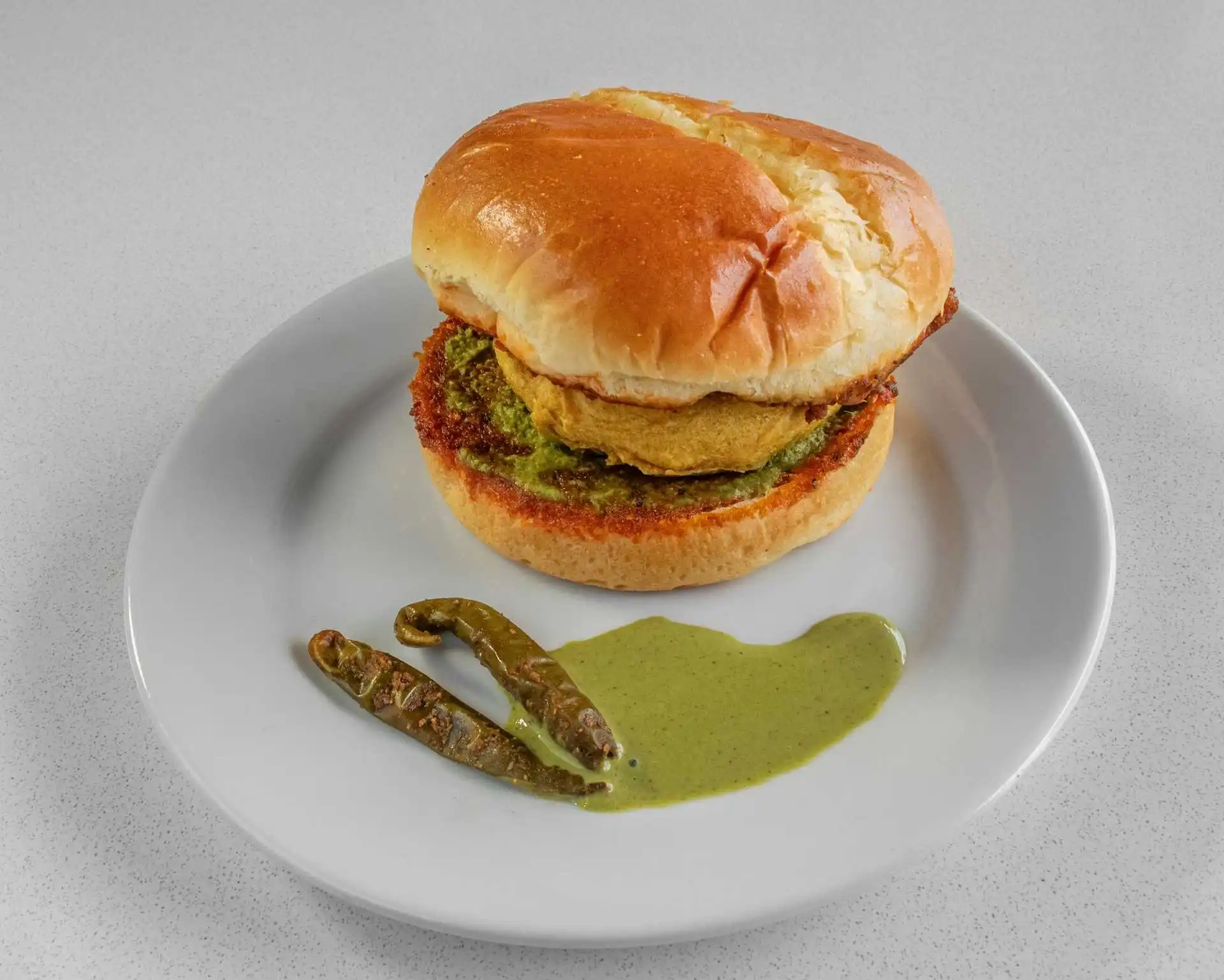 Vada pav potato patty burger with green chutney at Virk Dhaba London Ontario